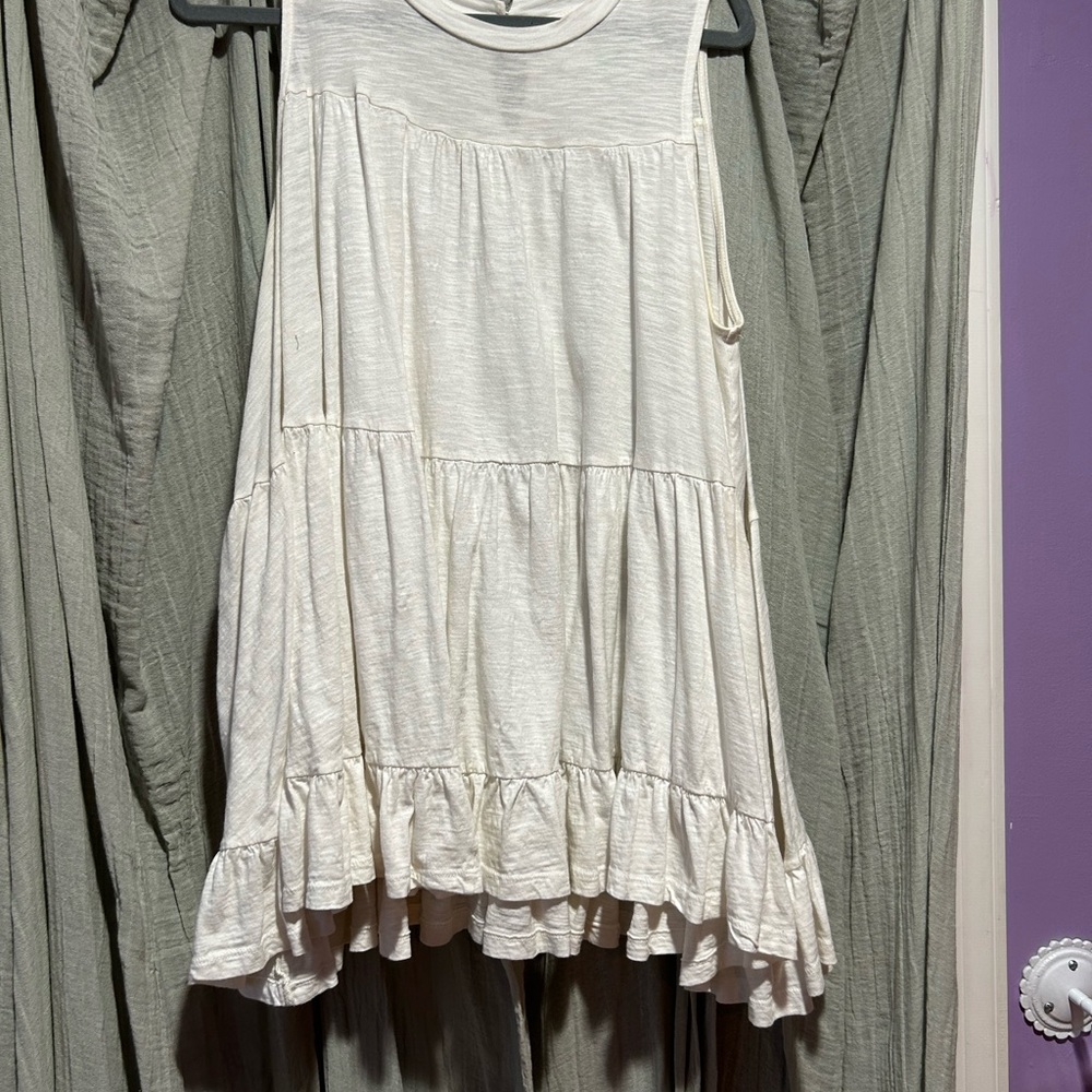 Sleeveless Cream Ruffle Hem Top